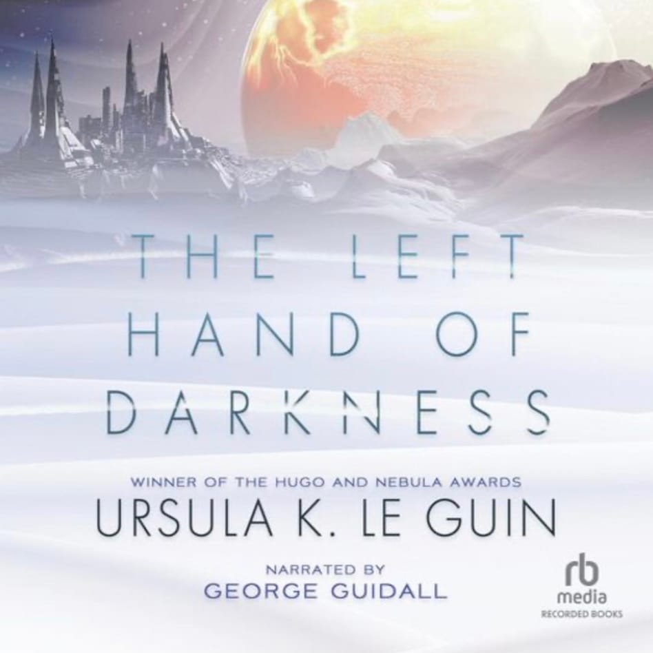 The image is a book cover. It features a snowy landscape with a castle silhouetted against an aurora sky. In the foreground, there’s a large planet. Above the title text, there are snowy mountains and a distant set of tall buildings in light and shadow. The title “The Left Hand of Darkness” is at the top in a stylized font with blue and purple colors. Below the title is the author’s name, Ursula K. Le Guin, presented in white letters against the dark background. At the bottom right corner, there is an illustration of a hand with the fingers curled around a black globe with snowy mountains visible on it. The text “Winner of the Hugo and Nebula Awards” is located below the title and illustration.